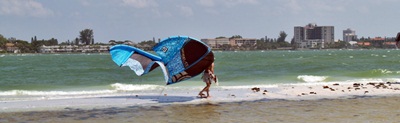 a kite boarder getting ready to hit the waves in Sarasota