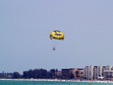 parasailing over the Gulf of Mexico beaches in Sarasota Florida