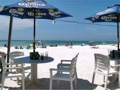 Umbrella tables at Sandbar Beach Restaurant Anna Maria Island